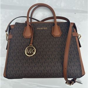 Brand new Michael Kors, Brown logo, and belted satchel. Mint condition.